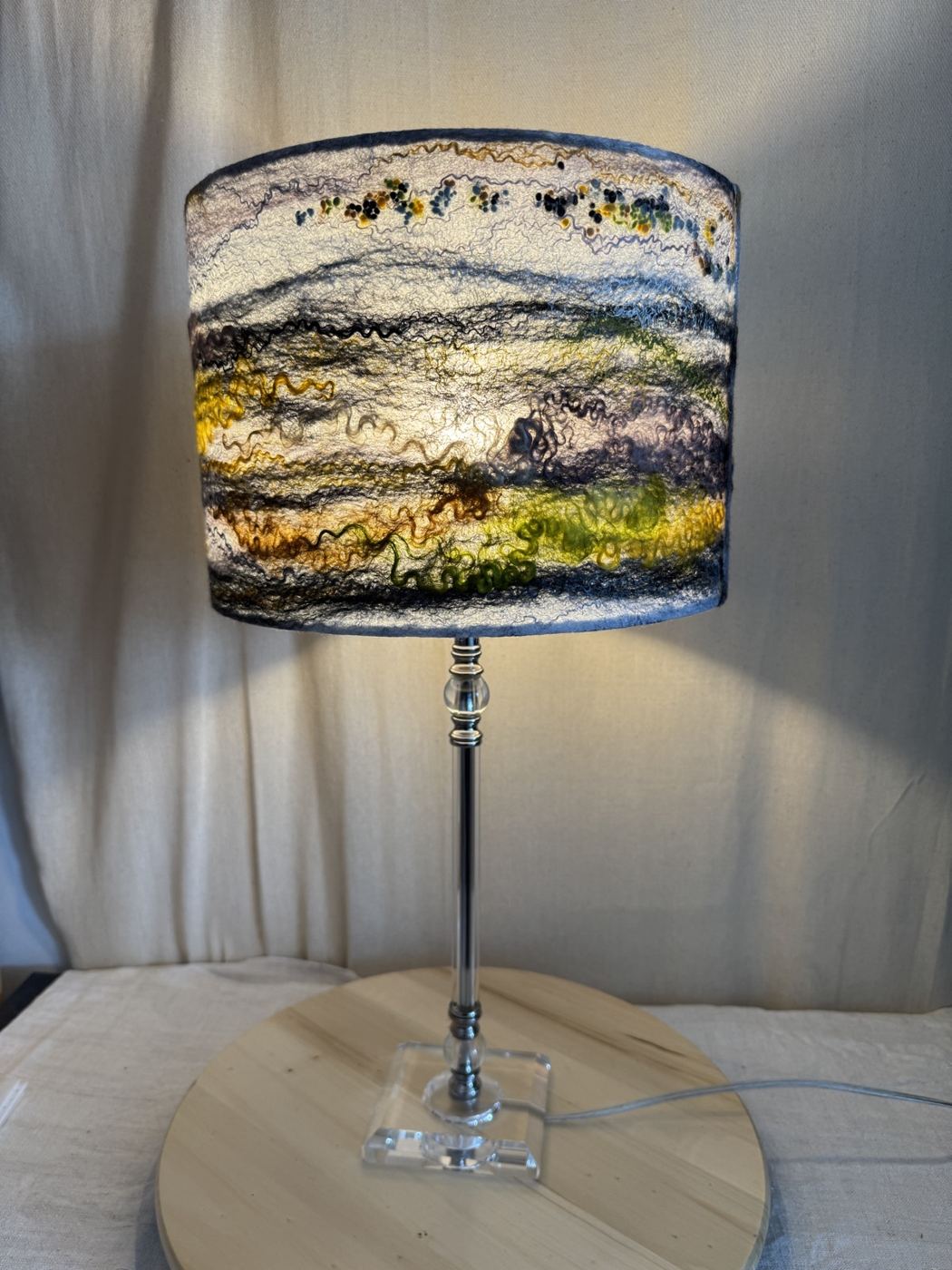 Felted landscape lampshade with hills in yellow, white and navy